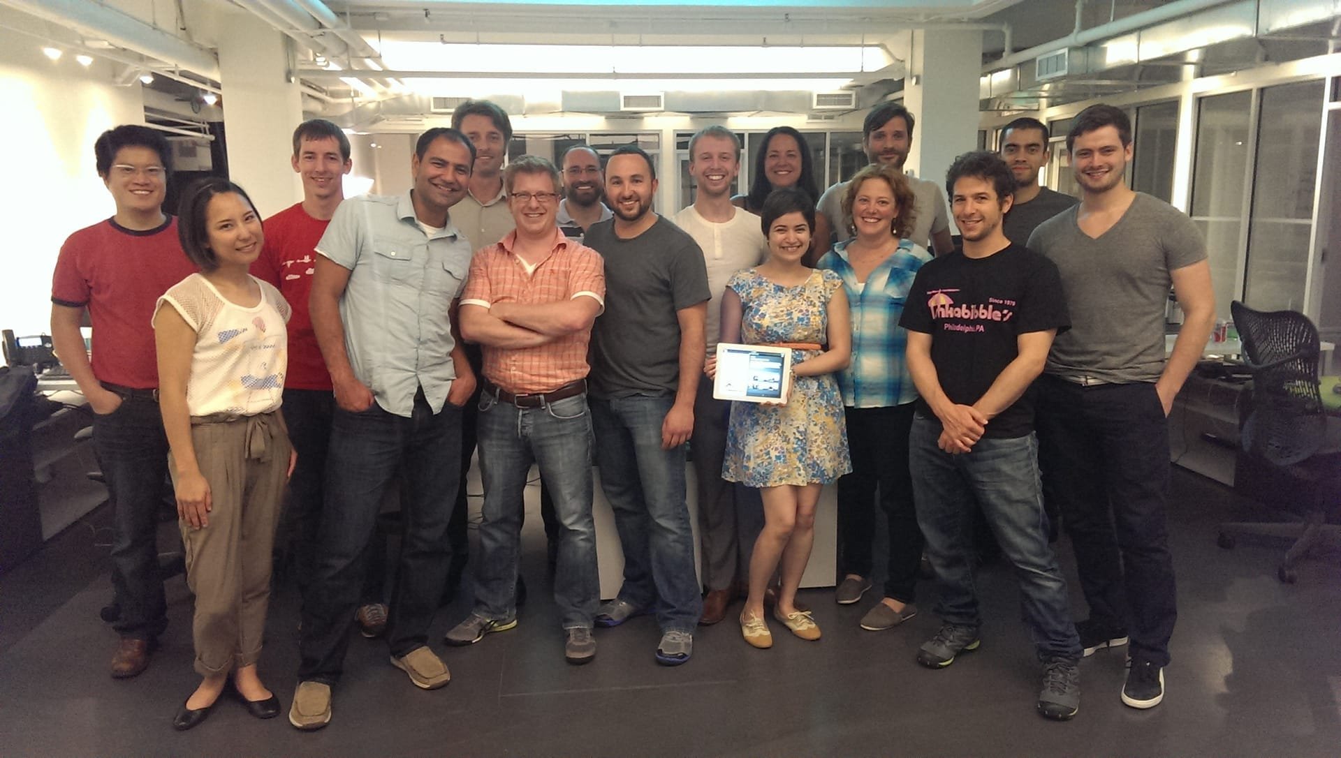 Team celebrating the completion of the Pearson app